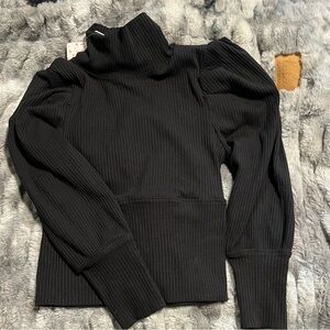 Free people nwt small 
Black Ribbed Turtleneck Sweater